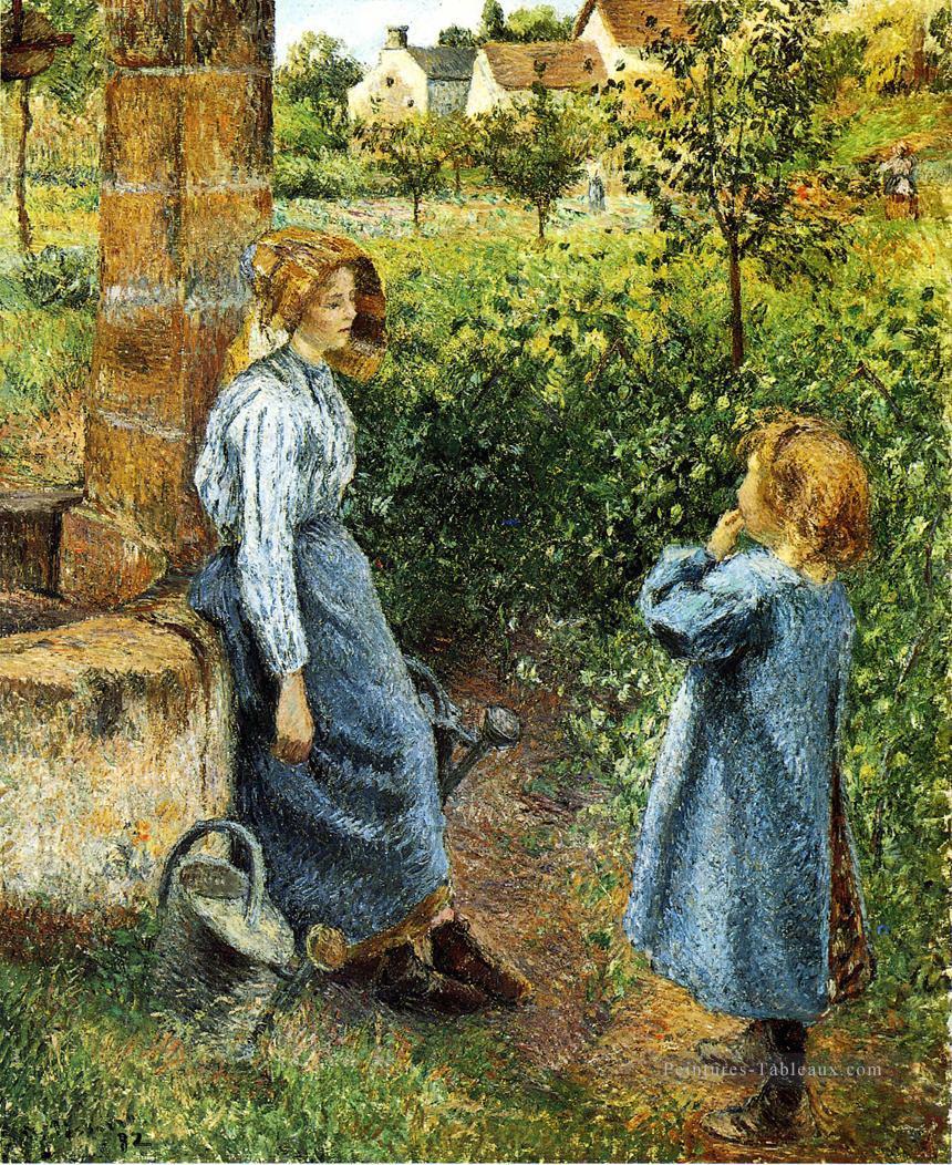jeune femme et enfant au puits 1882 Camille Pissarro Peintures à l'huile